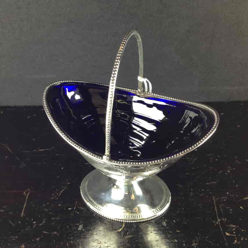 Sterling Silver, George III, sugar basket, c.1784. -1835