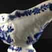 Bow sauceboat, rococo moulded with underglaze blue flowers, C. 1765 -2614