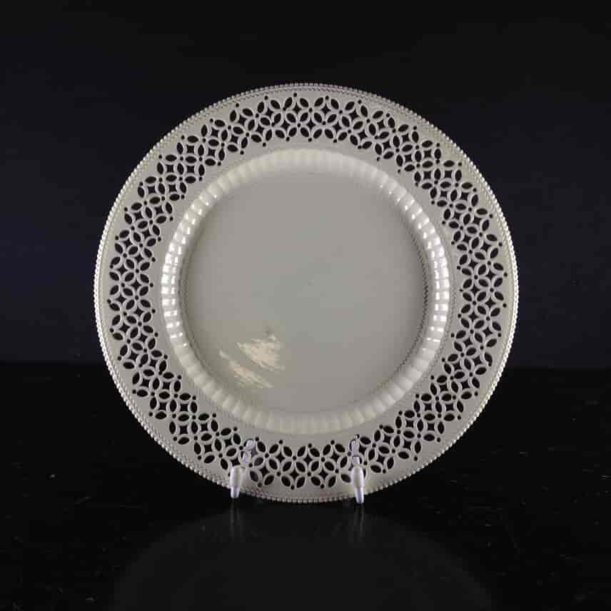 Creamware plate with pierced border, circa 1780-0