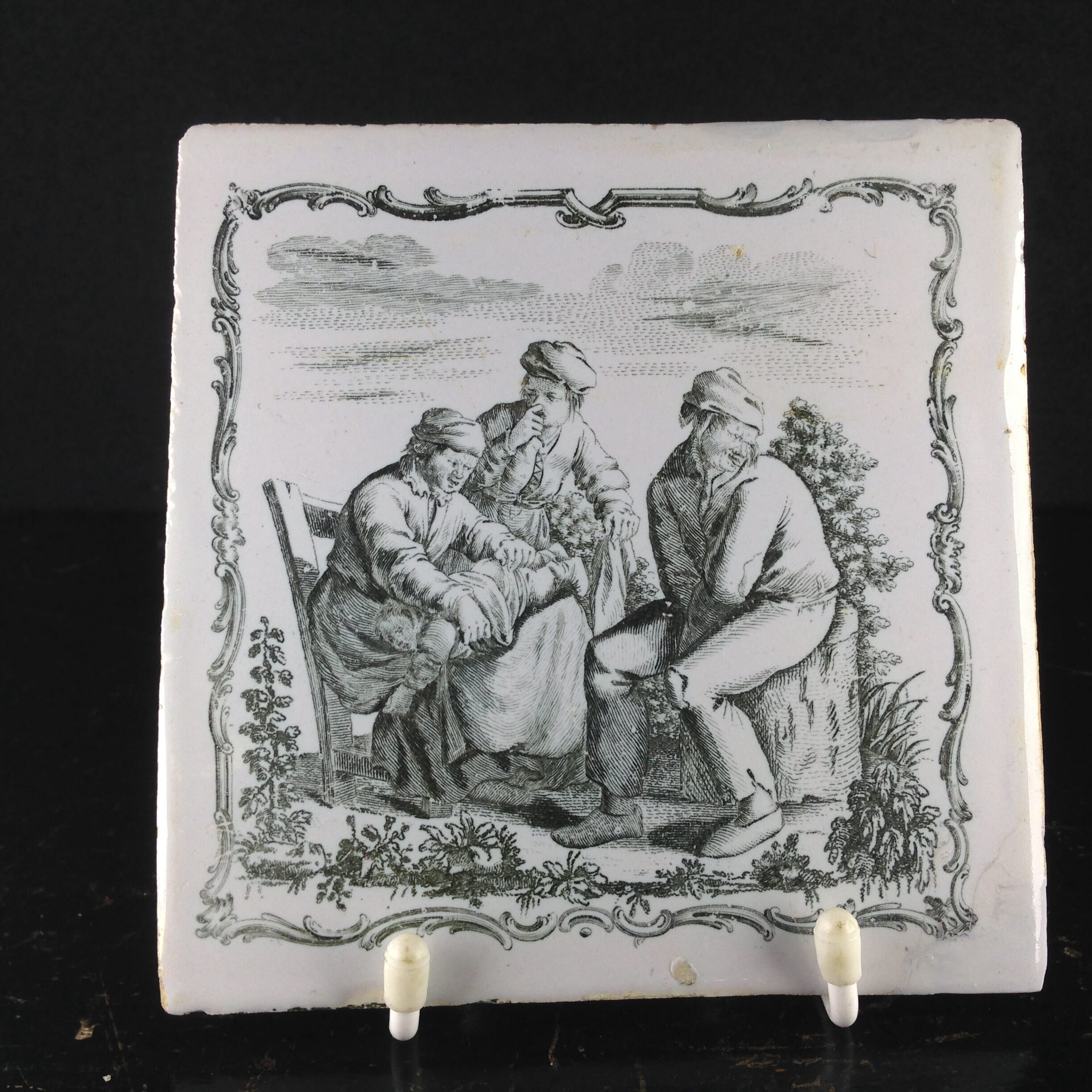 Liverpool delft tile with Sadler print, a smelly baby, c.1760. -0