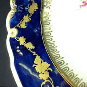 Chelsea plate with blue gilt moulded border, urn to centre, c.1760 -1394