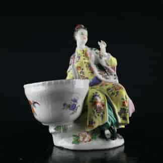 Meissen figure of a seated Turk lady, by J.F.Eberlein, c. 1750, later decorated. -0