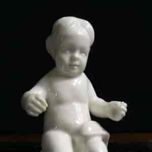 Orleans white porcelain figure of a seated boy, c. 1760 -10291