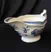 Caughley sauceboat, rib moulded with underglaze blue flower groups, c. 1780 -19838
