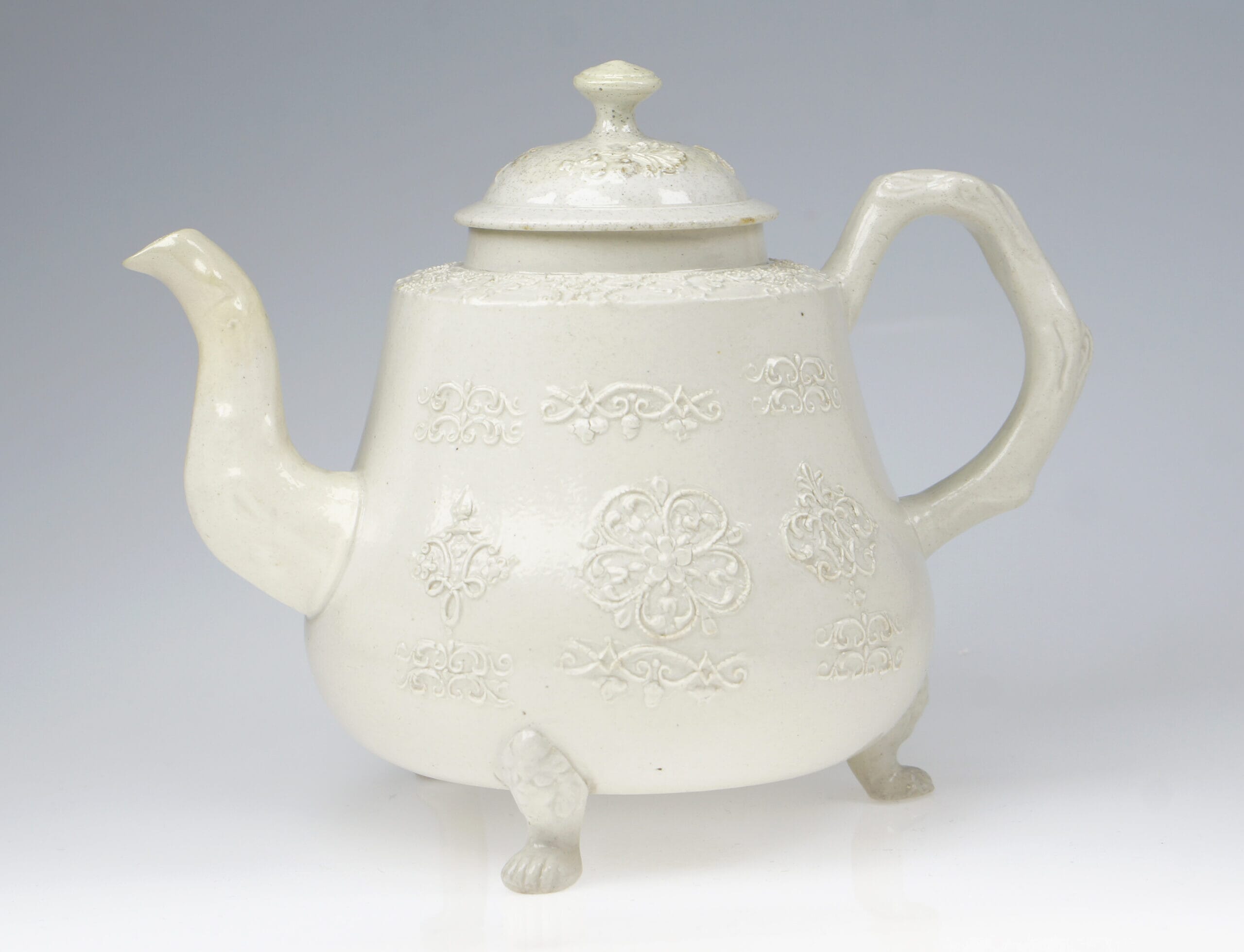 Saltglaze teapot, fine sprigging with crab-stock handle & lions paw feet, c.1760 -0