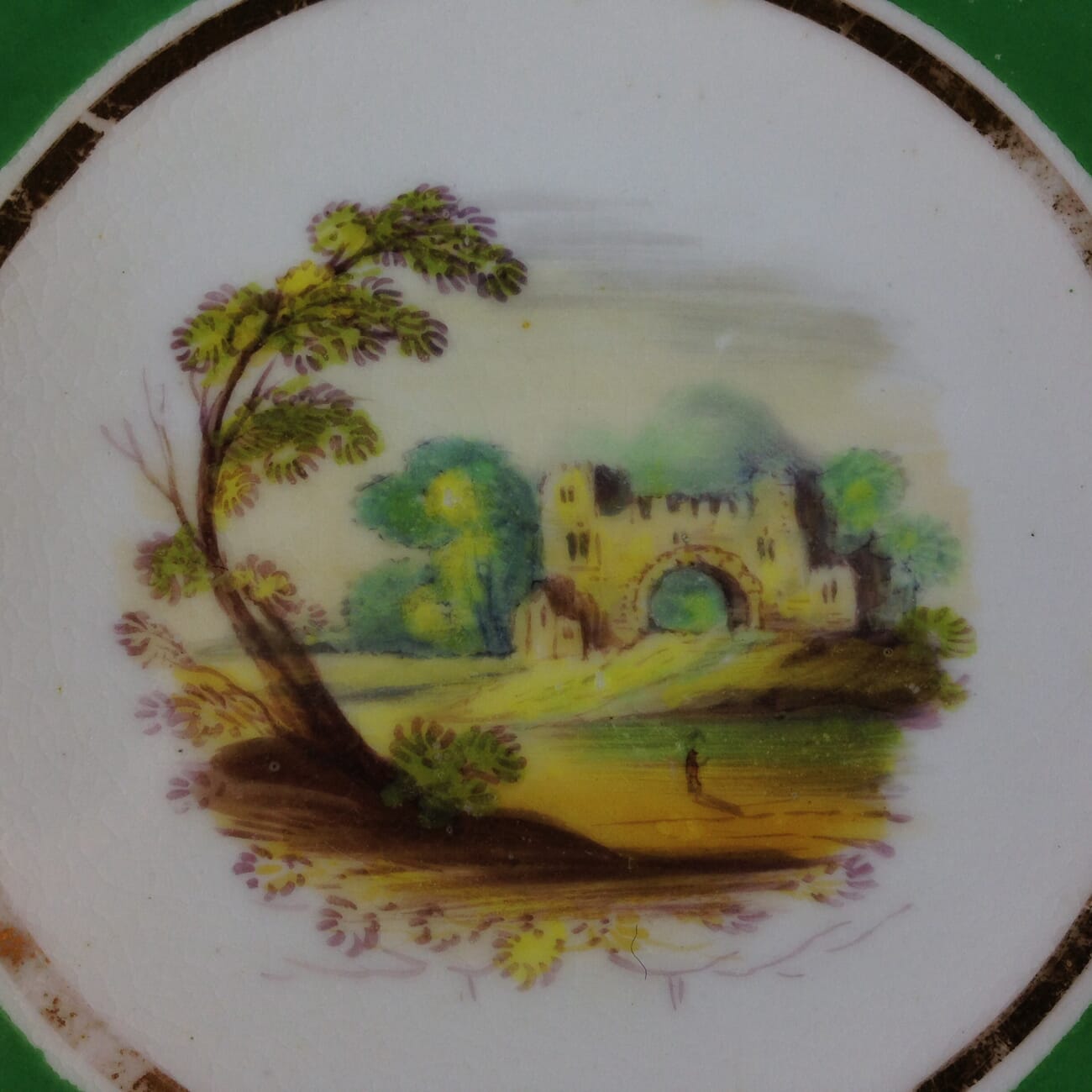 Coalport green ground teacup & saucer with scenes, pattern 509, c.1835-1680