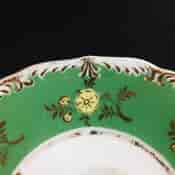 Coalport green ground teacup & saucer with scenes, pat.509, c.1835-1702