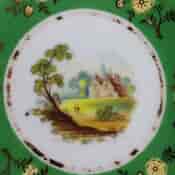 Coalport green ground teacup & saucer with scenes, pat.509, c.1835-1703