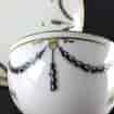 Chelsea-Derby teabowl & saucer, black swags & flower sprigs, c.1775 -1719