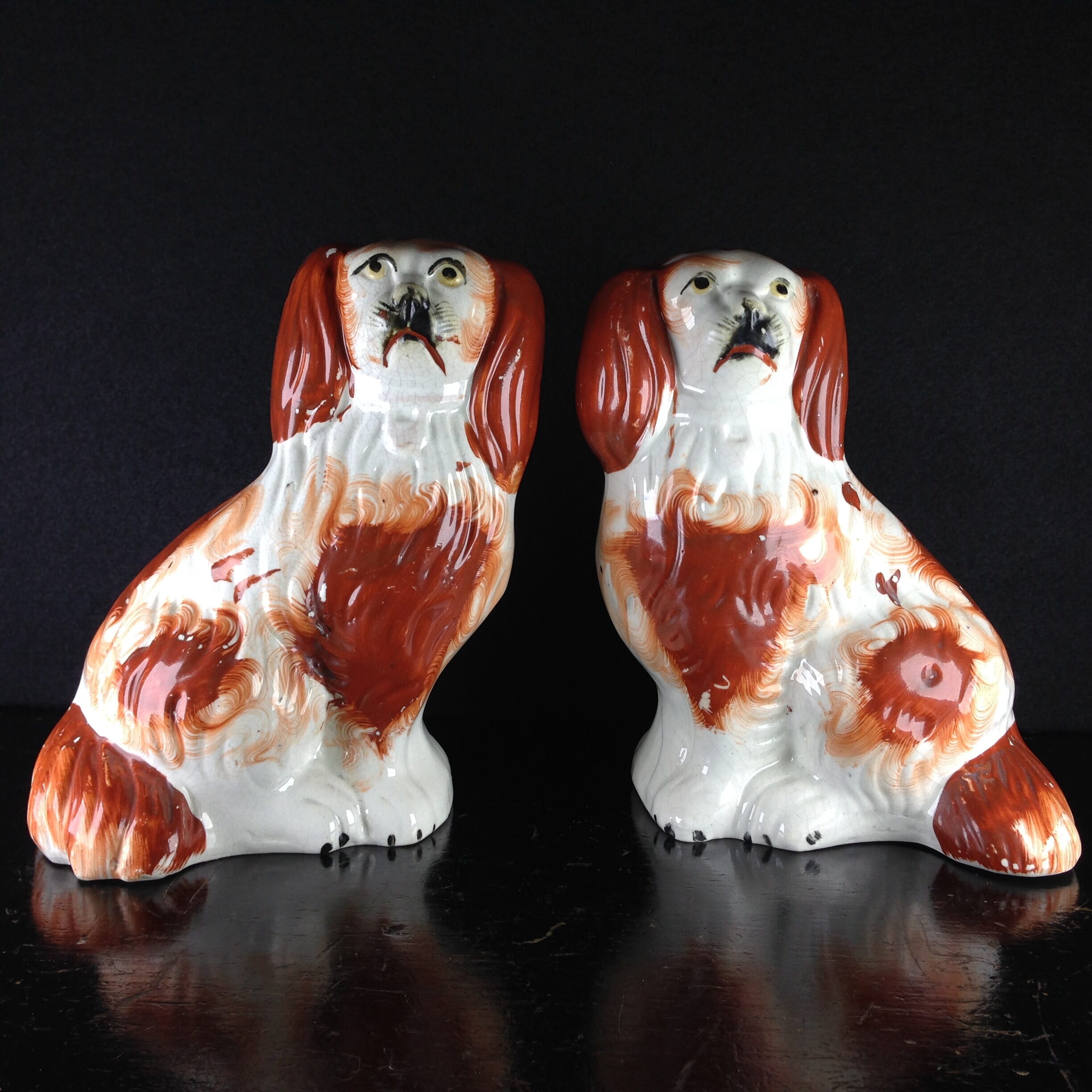 Pair of Staffordshire pottery spaniels, c. 1870-0