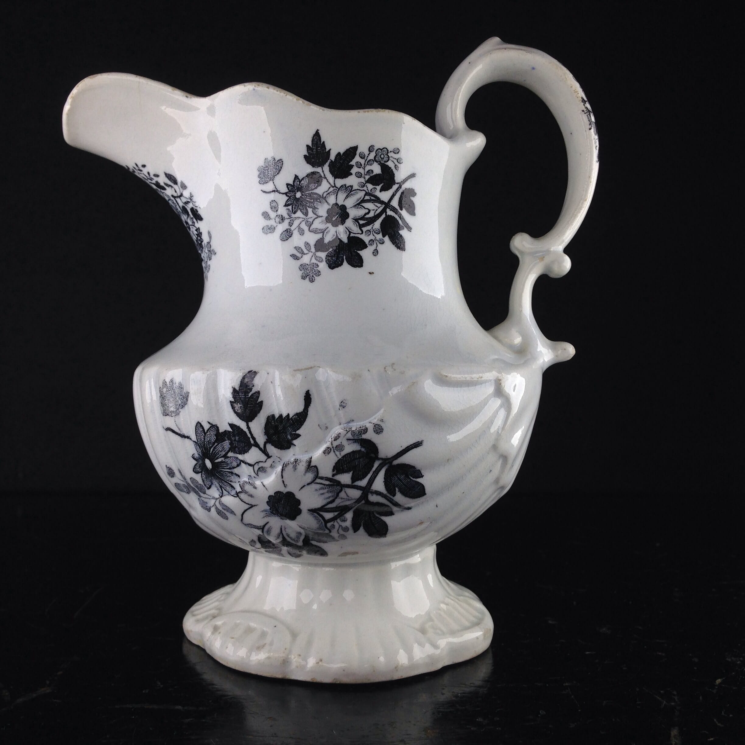 Black printed jug, shell moulded, possibly Welsh C. 1835. -0