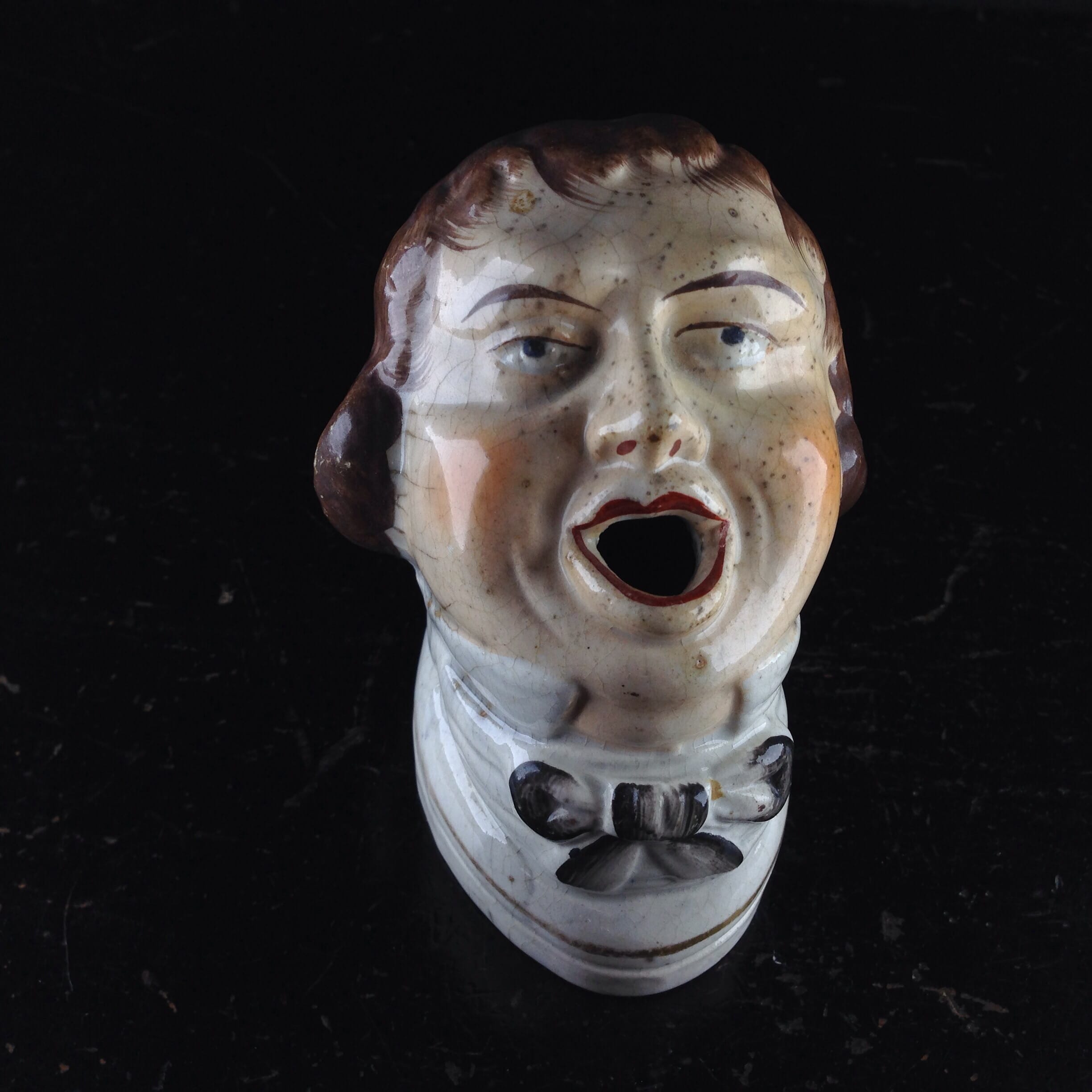 Staffordshire quill holder, a mans head, c. 1850 -0