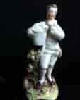 Staffordshire pottery boy with grapes, circa 1860. -0