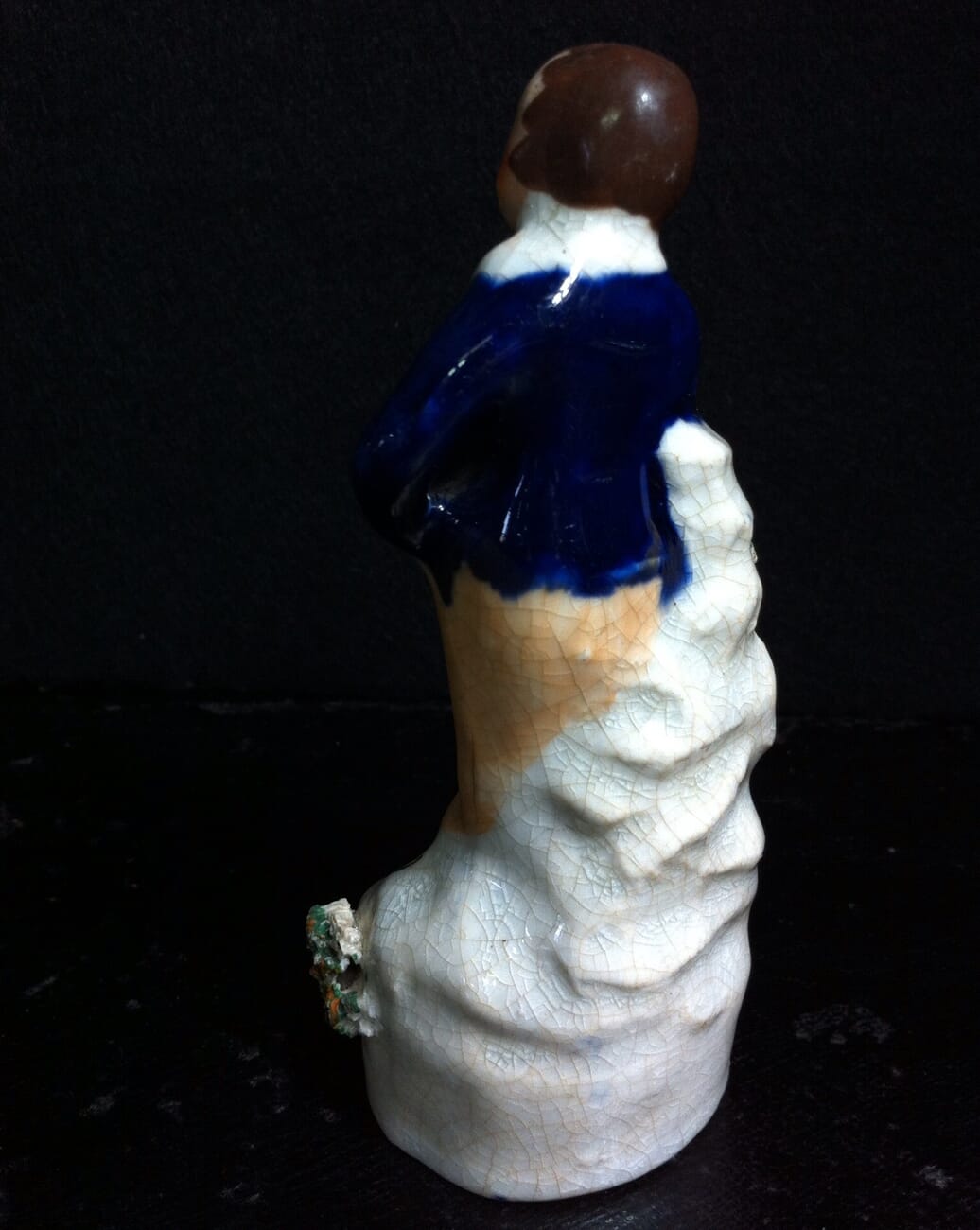 Staffordshire miniature pottery figure of a youth, circa 1850. -10966