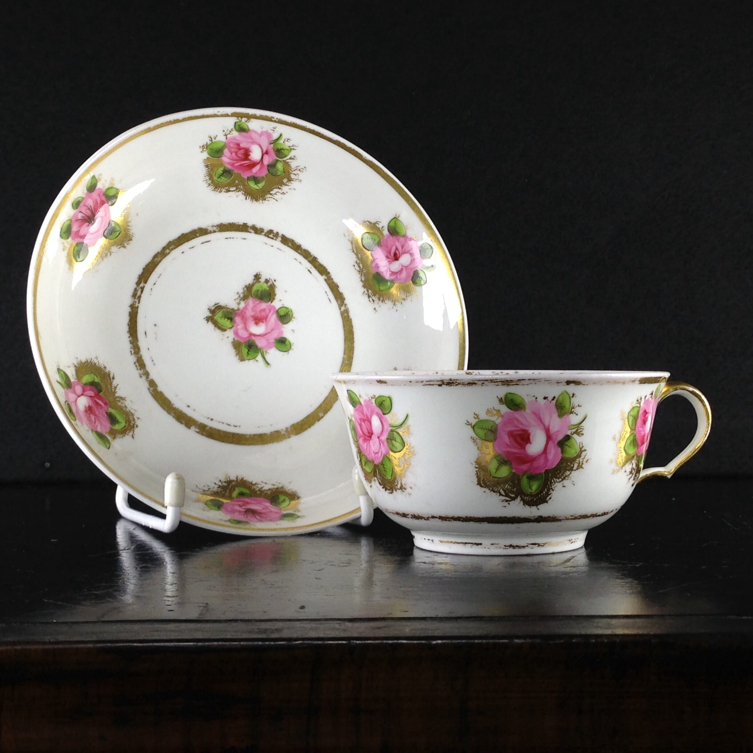 Swansea cup & saucer with rose painting, c. 1820. -0