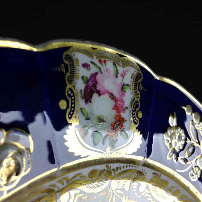 Coalport plate, moulded blue border with fine flowers, c.1820. -1365