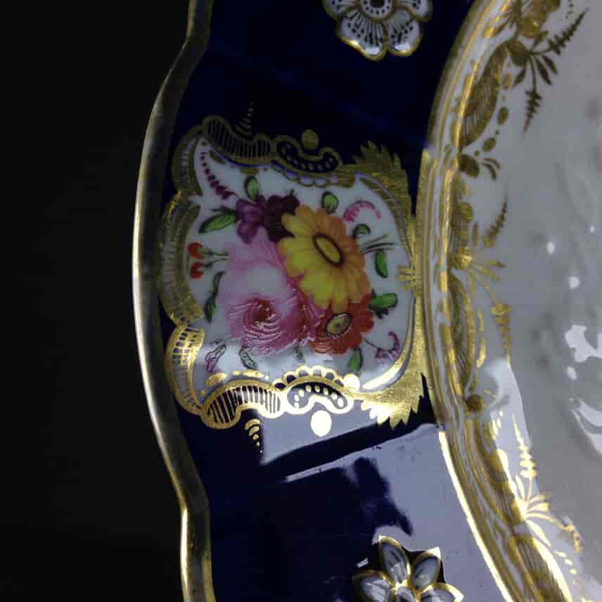 Coalport plate, moulded blue border with fine flowers, c.1820. -1369