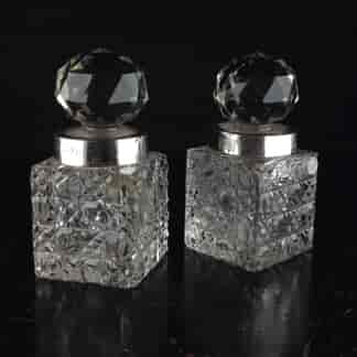 Pair of hobnail cut crystal perfume dressing table bottles, silver mounts London 1899-0