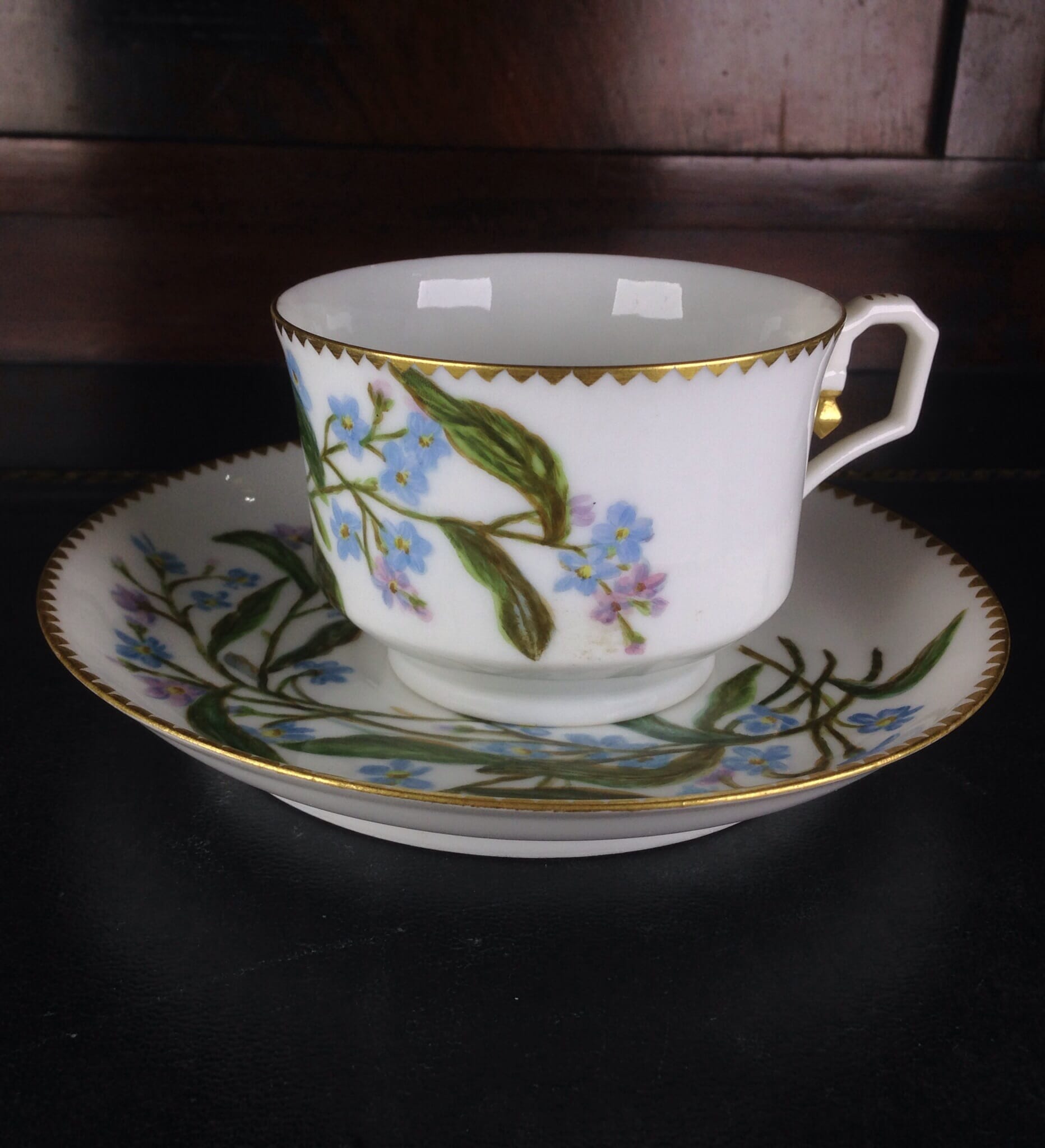 Fine continental porcelain cup & saucer hand painted with flowers, c.1890-0