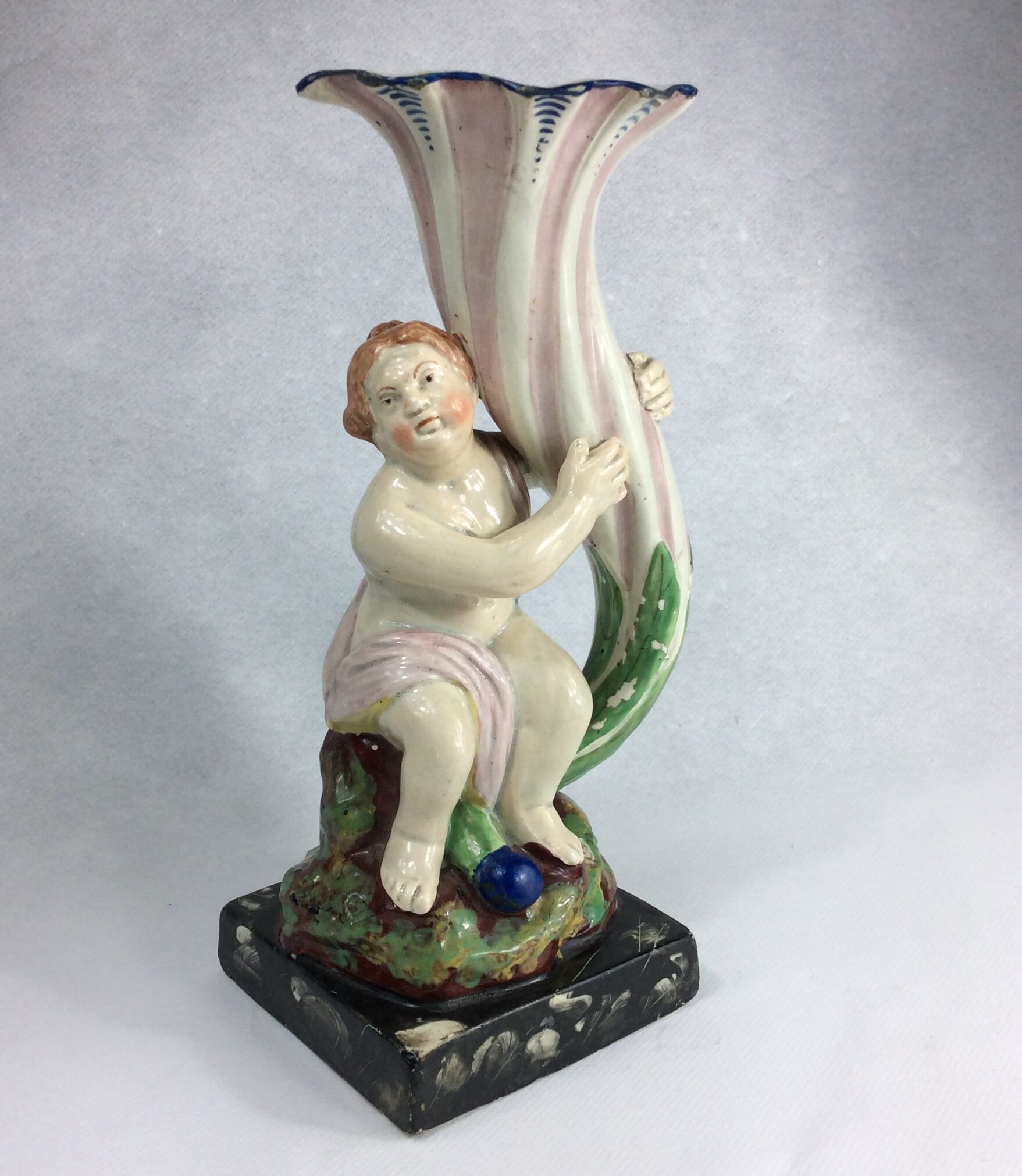 Staffordshire Cherub with cornucopia, C. 1800 -0