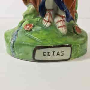 Early Staffordshire pottery figure of Elias, with raven & loaf, c. 1820-23196