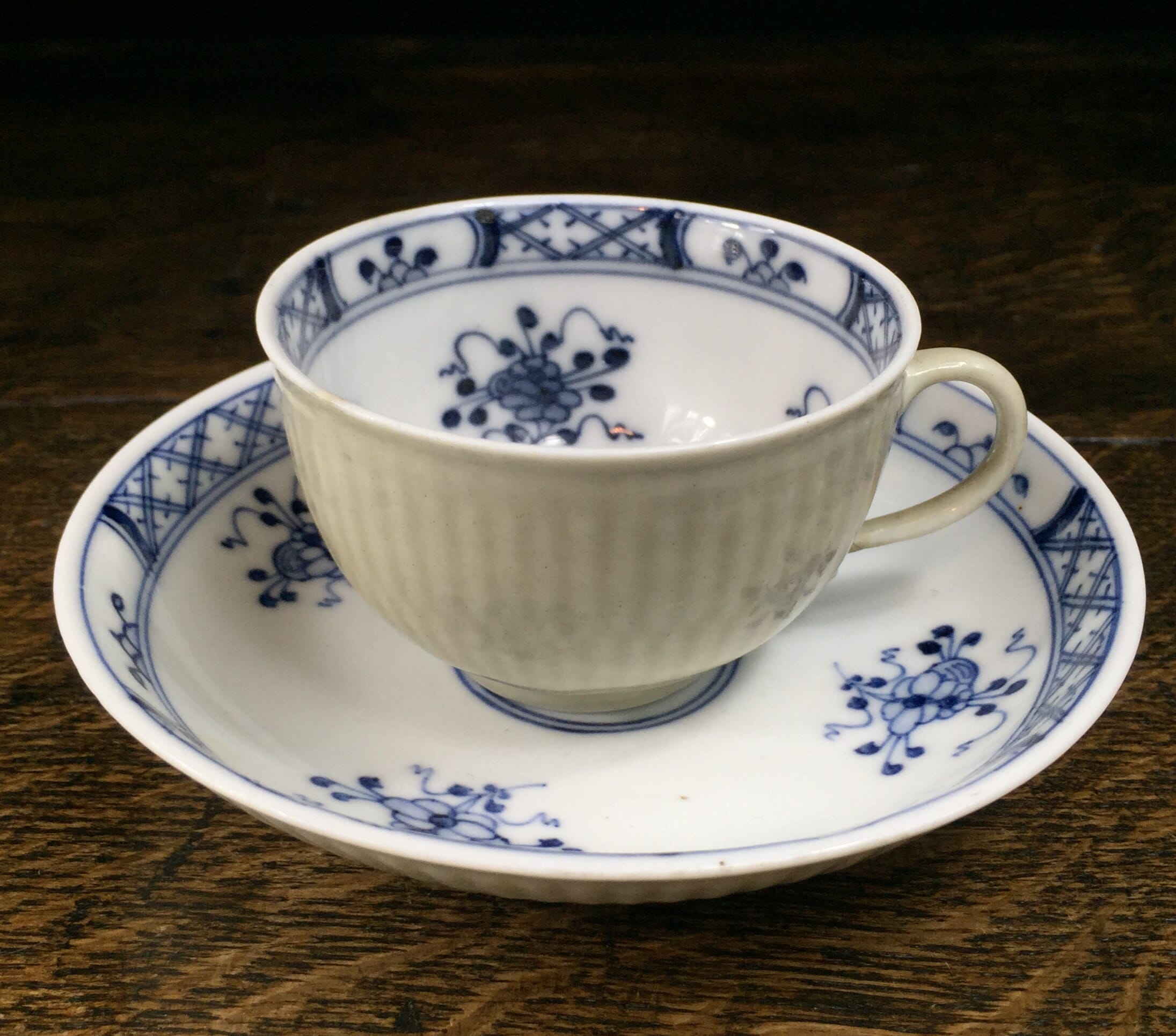 Meissen cup & saucer, broken reeding with celadon ground & blue oriental flowers, c.1730 -0