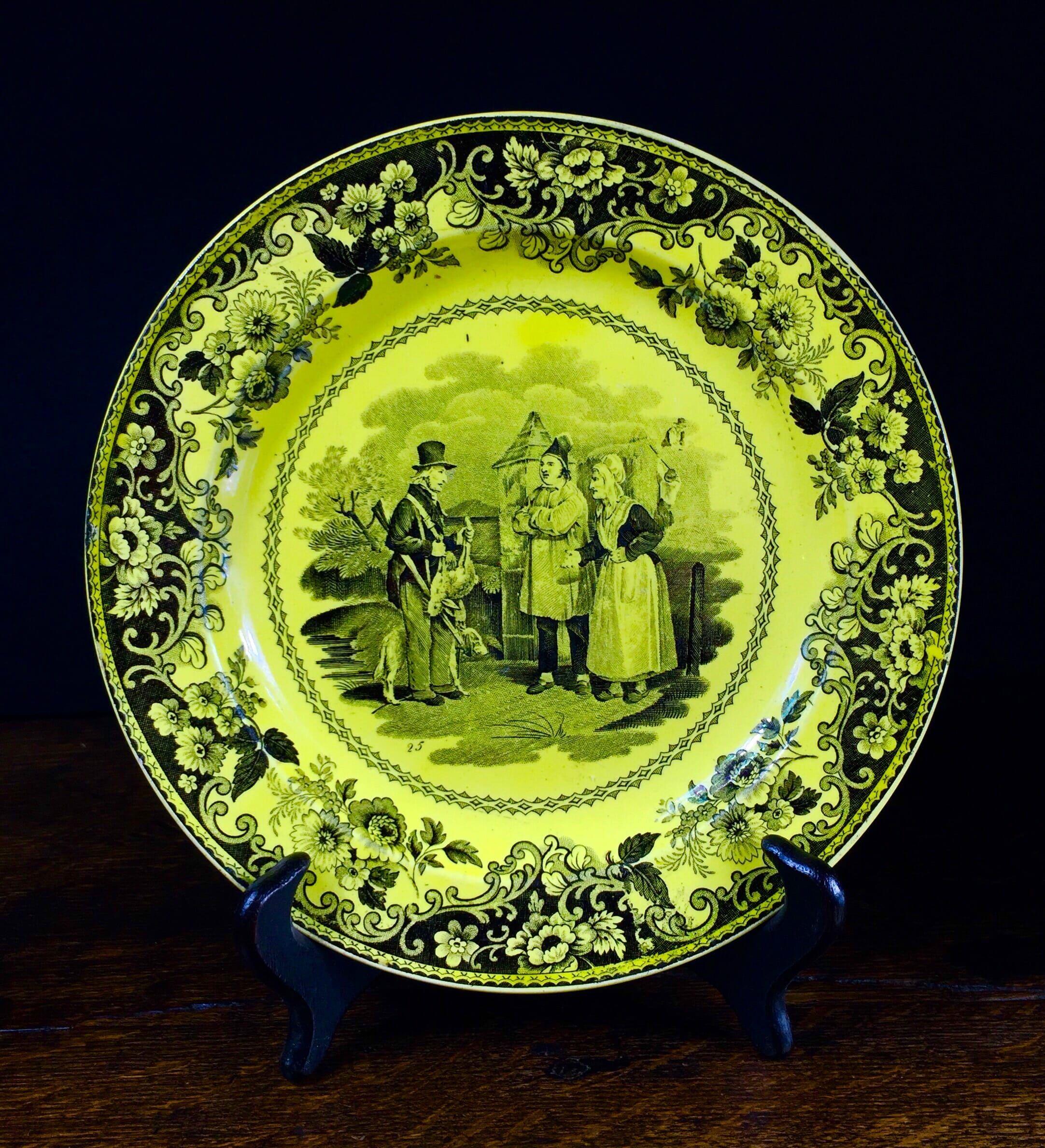 Creil plate, canary yellow with black scenes, c.1830 .-0