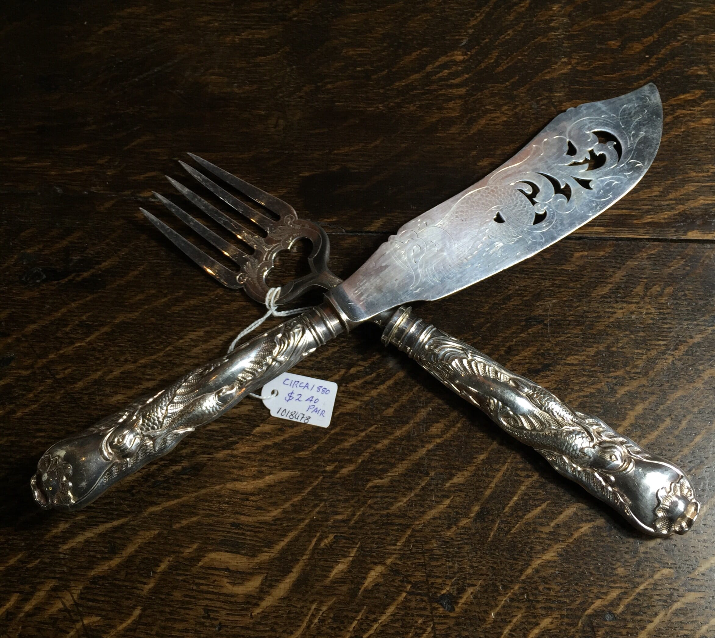 Pair of servers with Baroque dolphin handles, c.1880-0