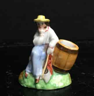 German porcelain match holder, man with barrel & axe, Circa 1880-0