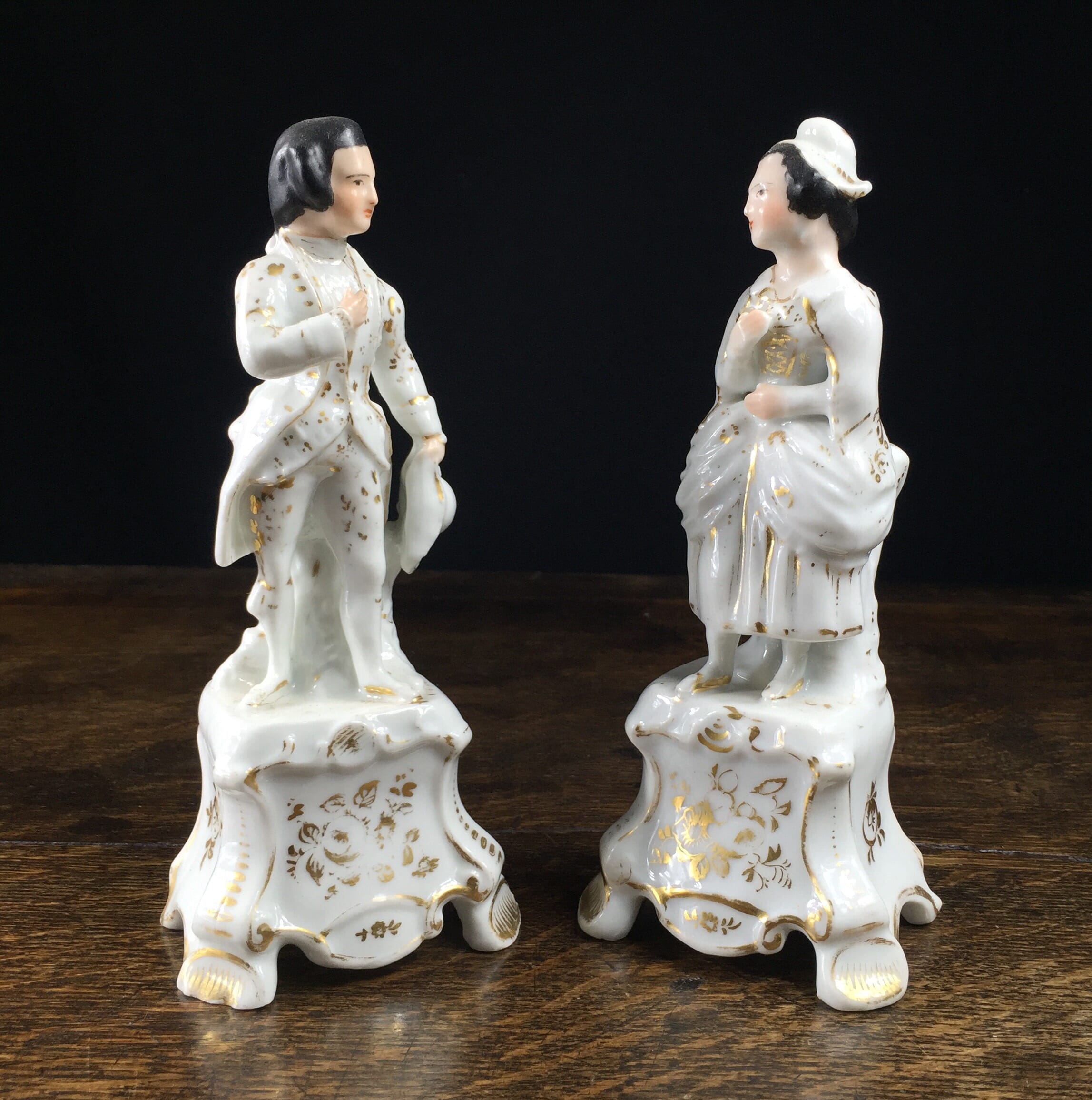 Pair of French porcelain figures on plinths, 19th century-0