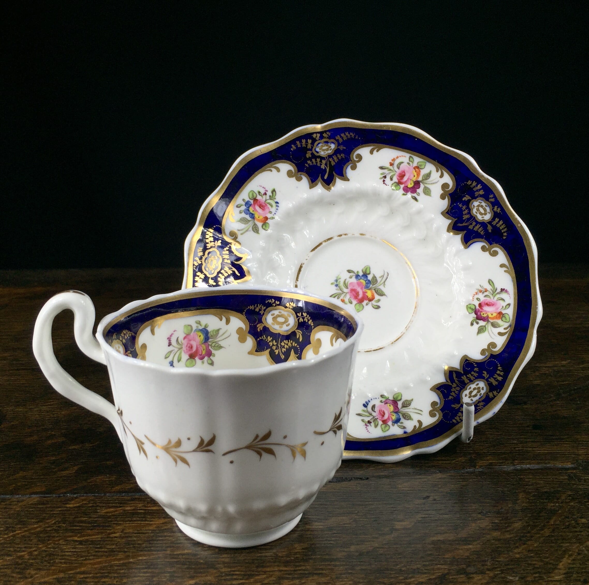 English bone china cup & saucer with “hockey stick” moulding & fine painting, C. 1825 -0
