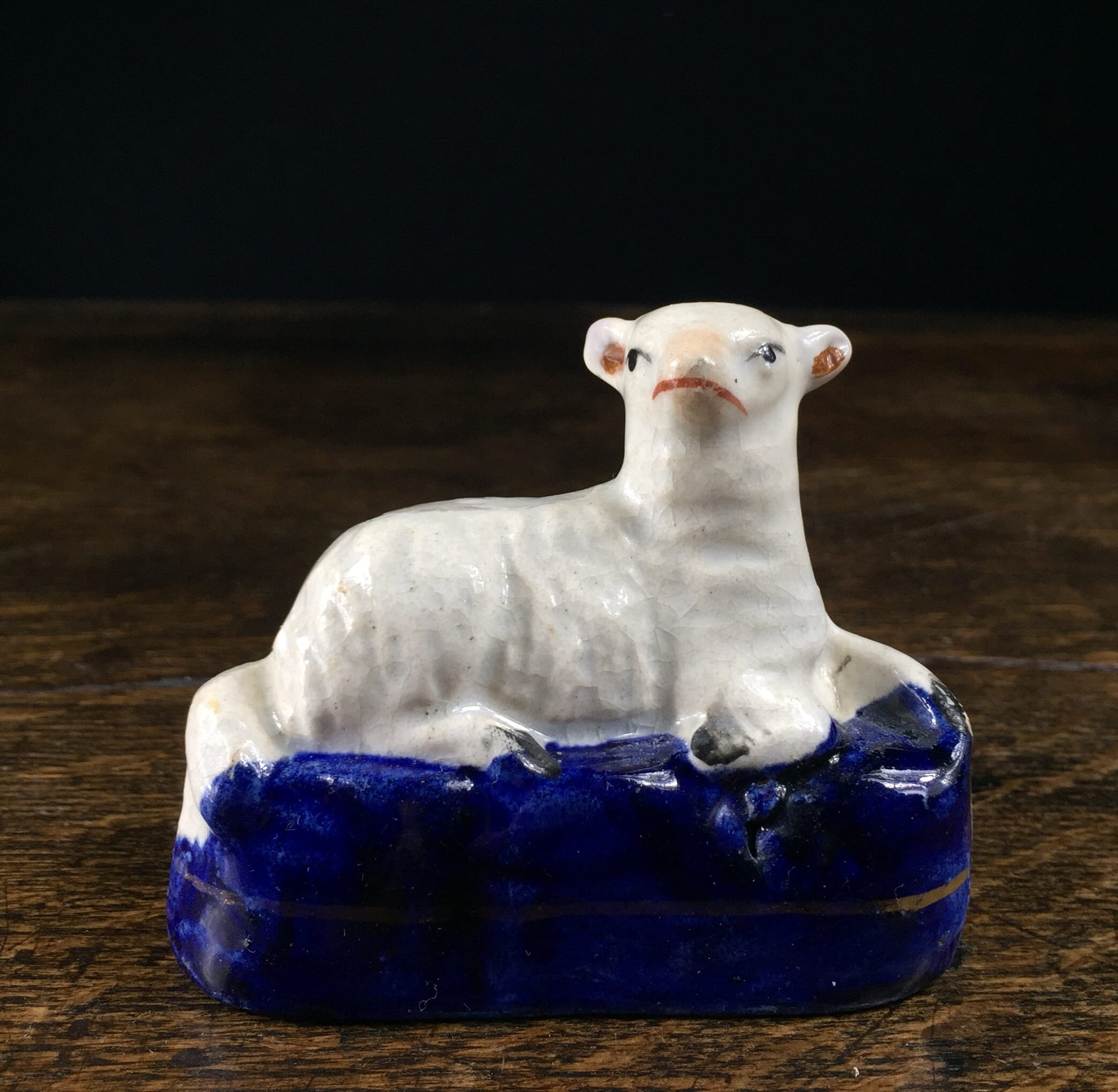 Staffordshire sheep on blue base, circa 1870-0