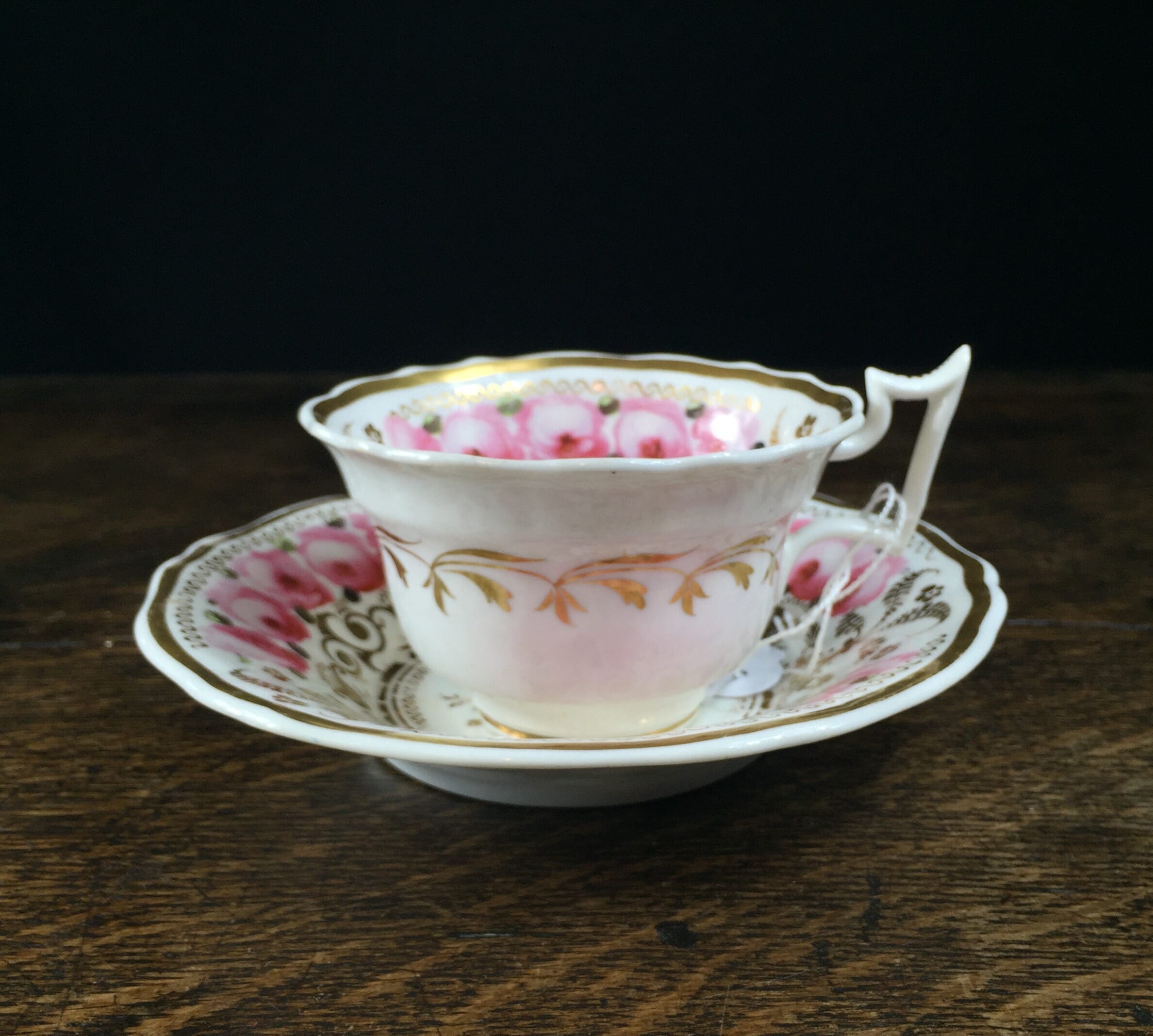 Newhall cup & saucer, brightly painted roses & gilt , C. 1830 -0