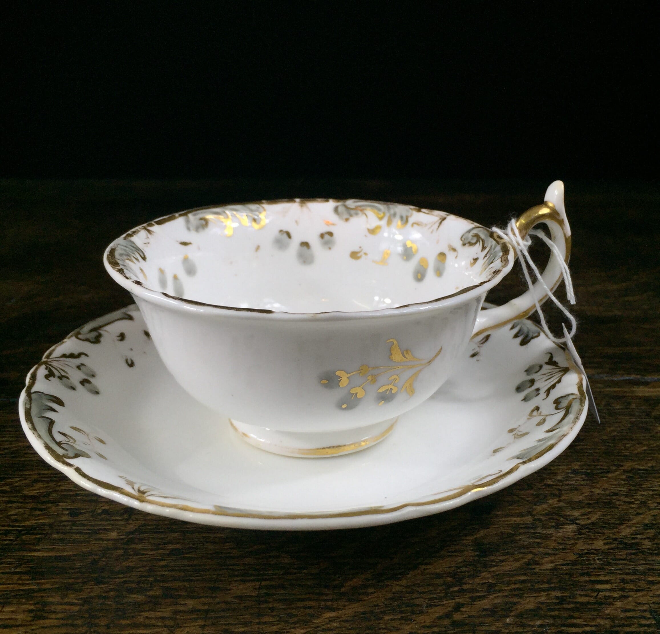 Rockingham tea cup & saucer, grey gilt foliage, C.1835 -0