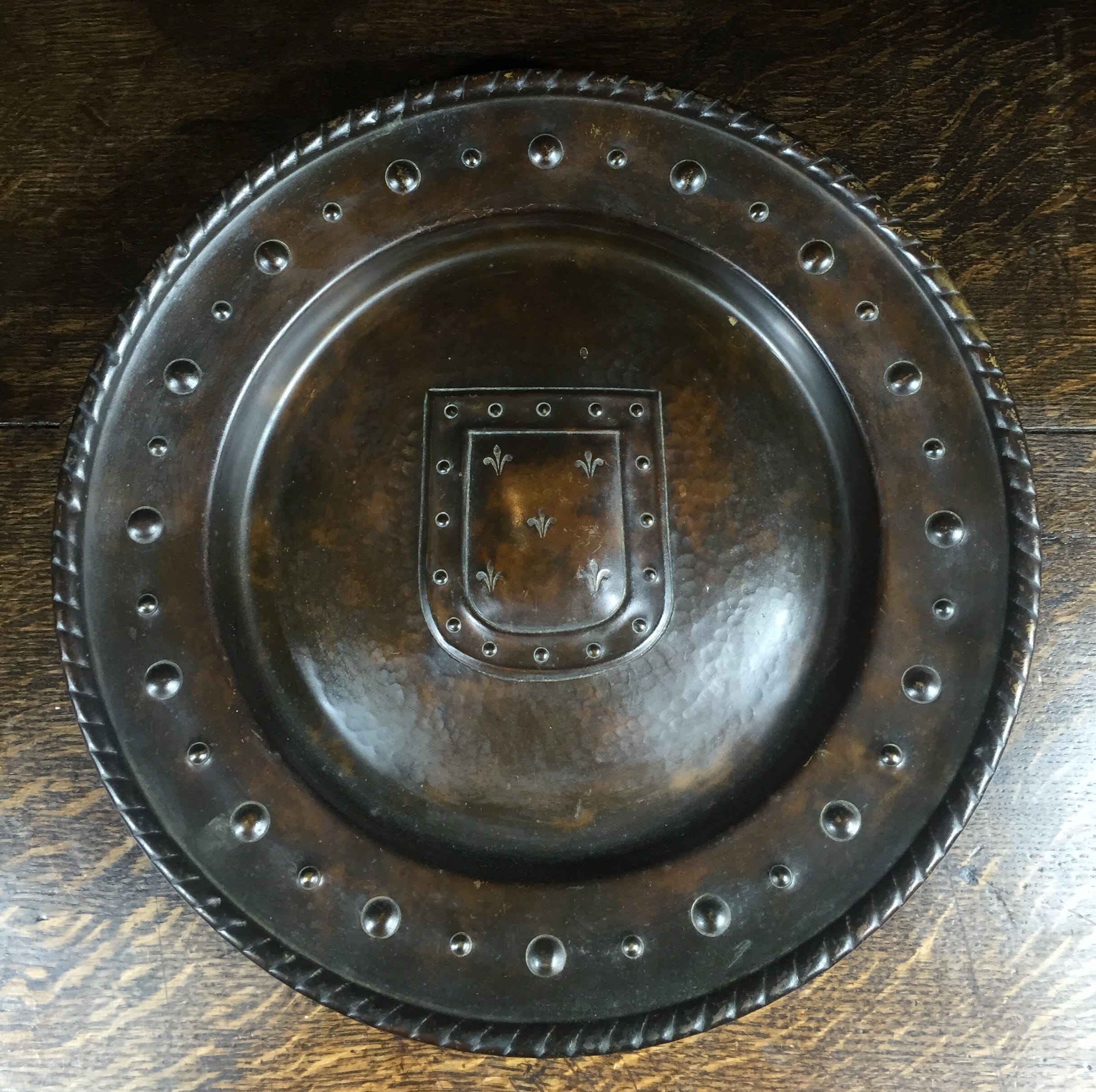 Brass wall plaque with shield and fleur de lis, 19th century-0