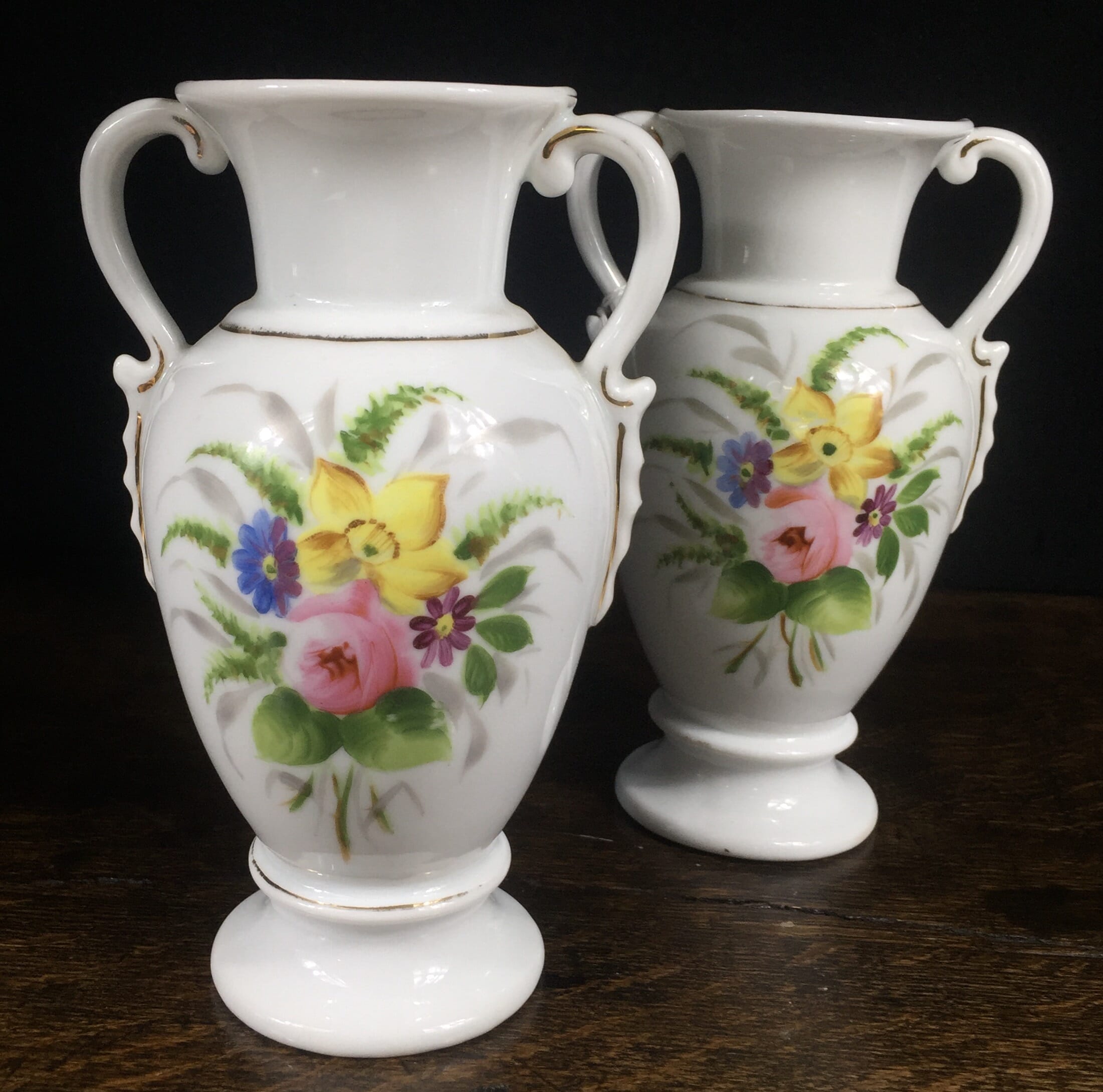 Pair of Paris porcelain urn shaped vases with flowers, c. 1870-0