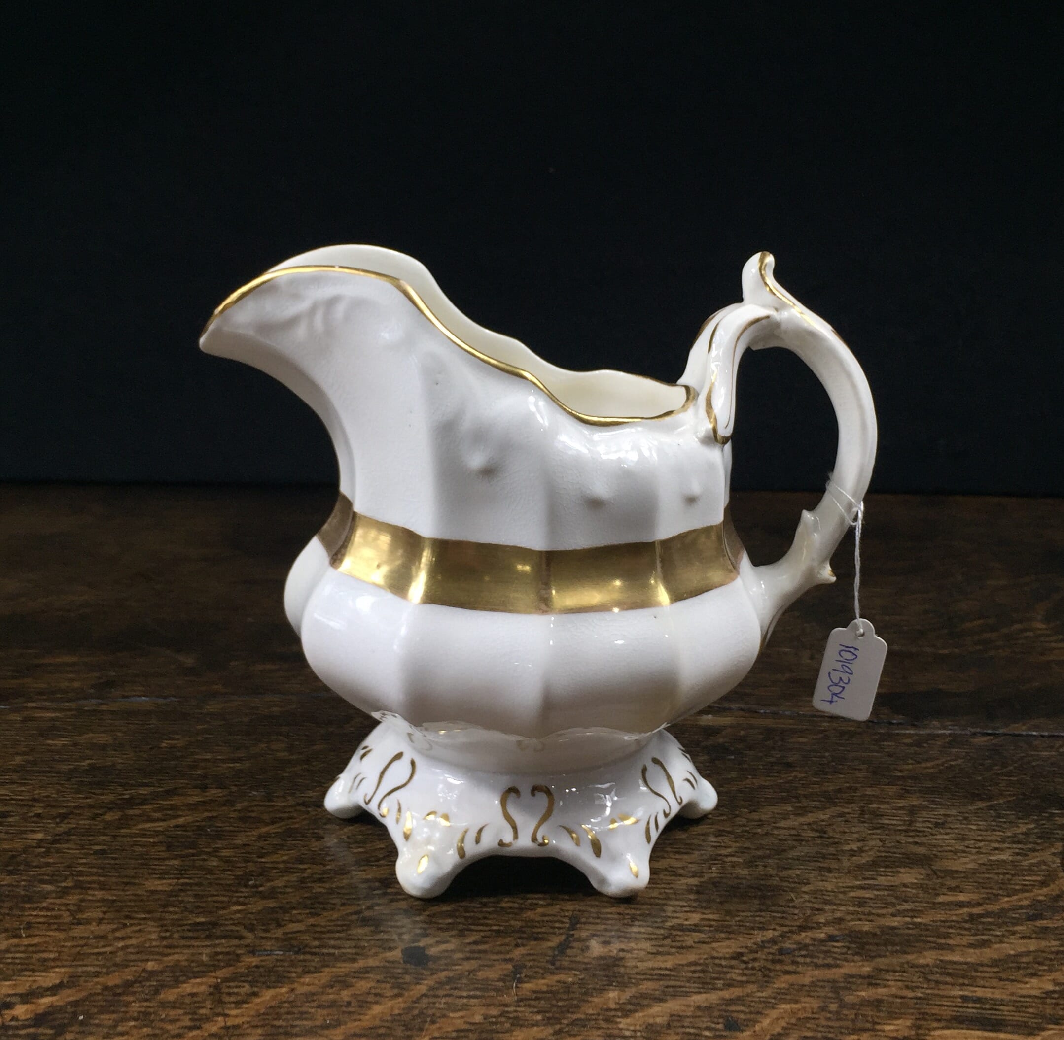Staffordshire porcelain jug, rococo handle, c.1850-0