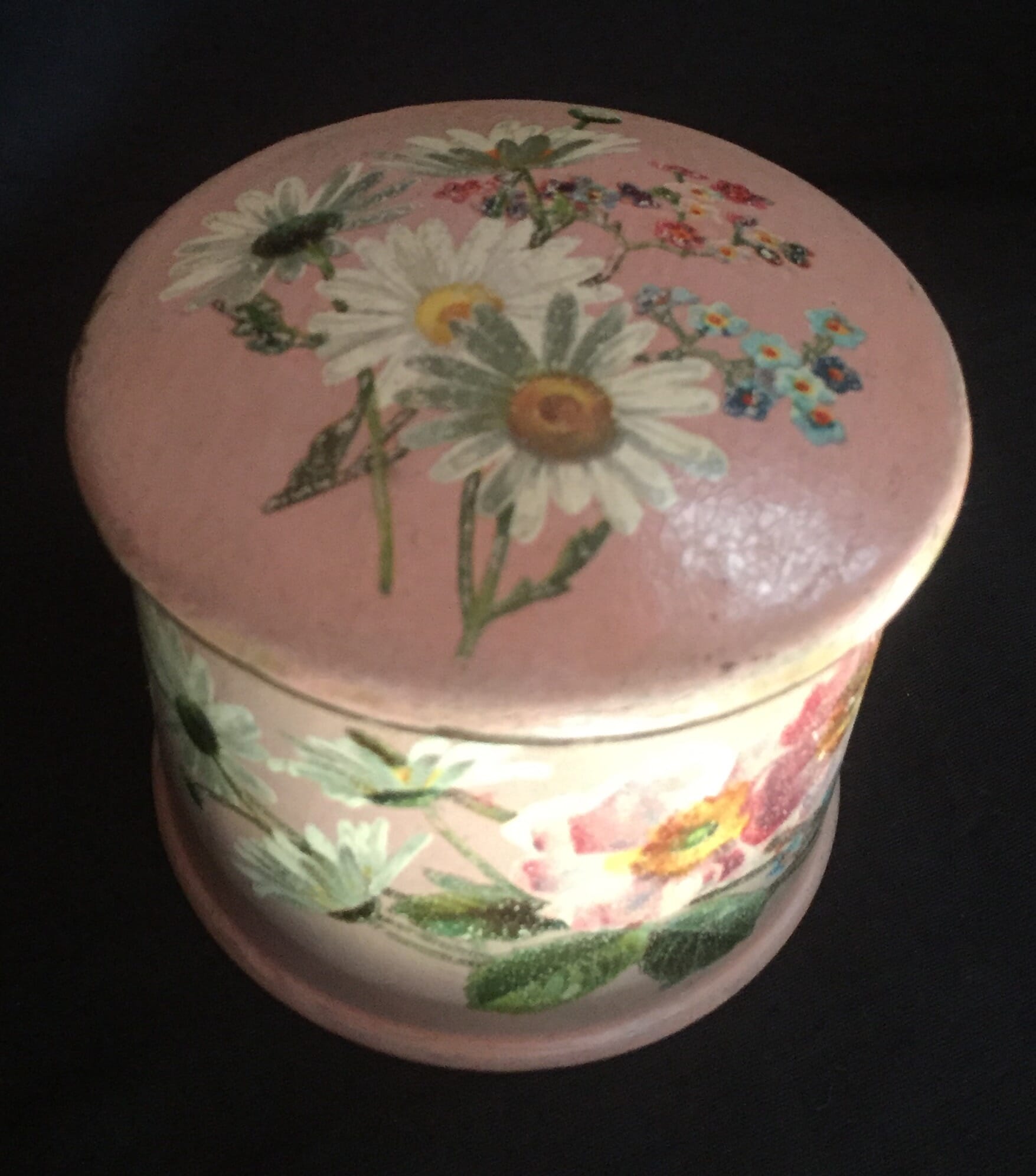 Victorian paper mache lidded box decorated with flowers painted on a pink ground, c. 1860-0