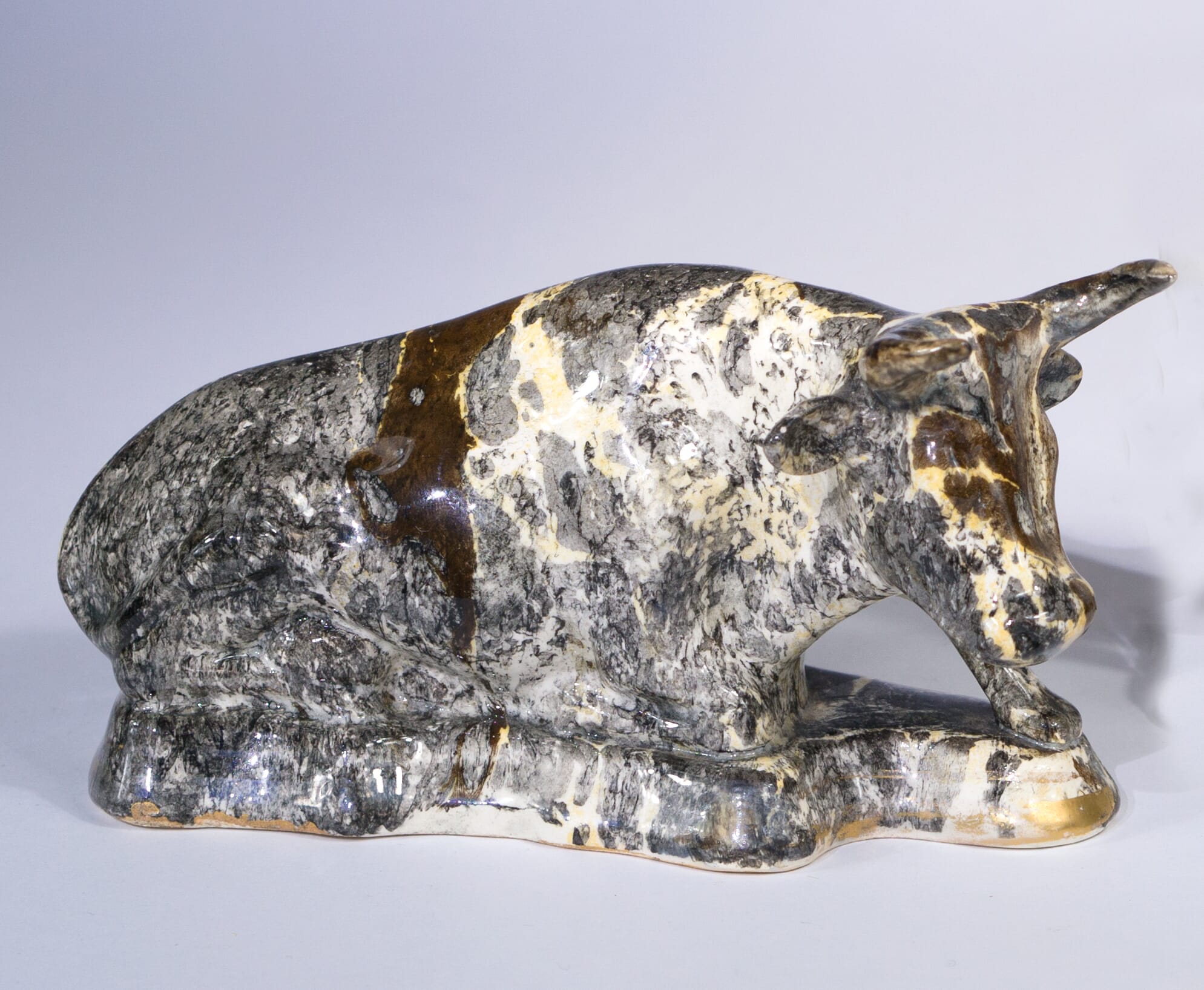 Pottery cow with marbled glaze, 19th century-0