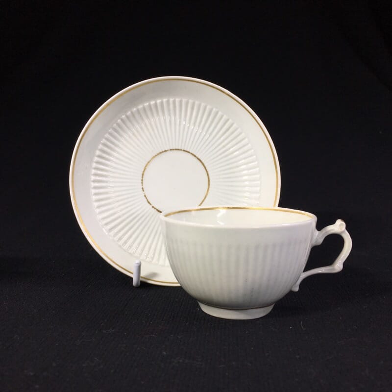 Worcester cup & saucer, fluted with simple gilt dec c.1770-0