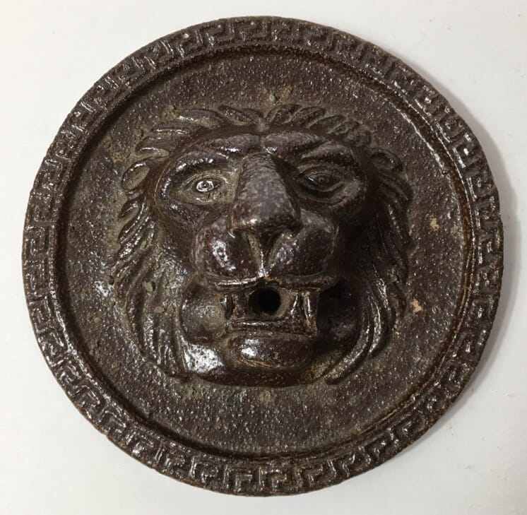Pottery lions head roundel, early 20th century -0