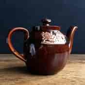 Rockingham glaze teapot with sprigging, C. 1830 -16957