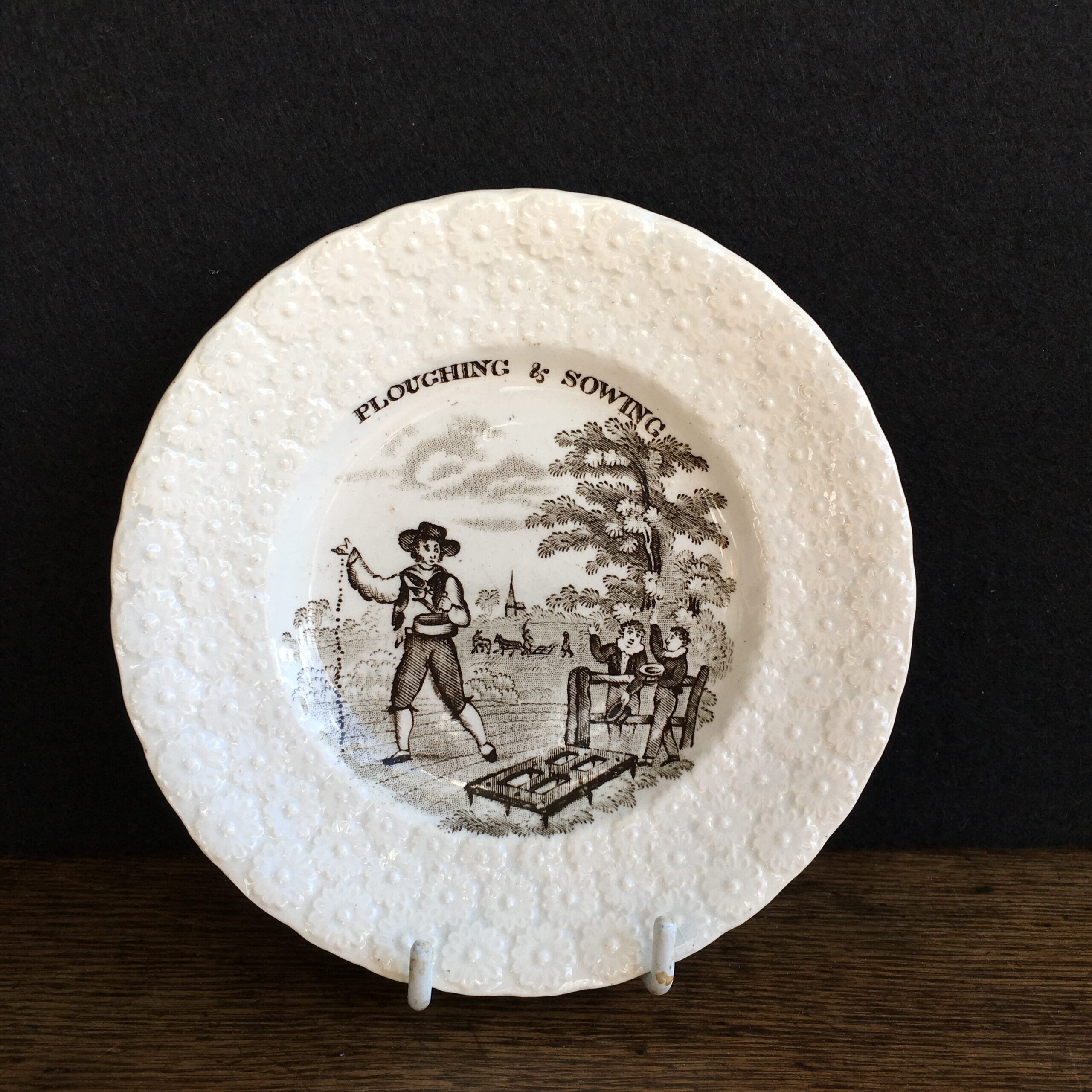 Childs plate with brown 'PLOUGHING & SOWING' , c.1840-0