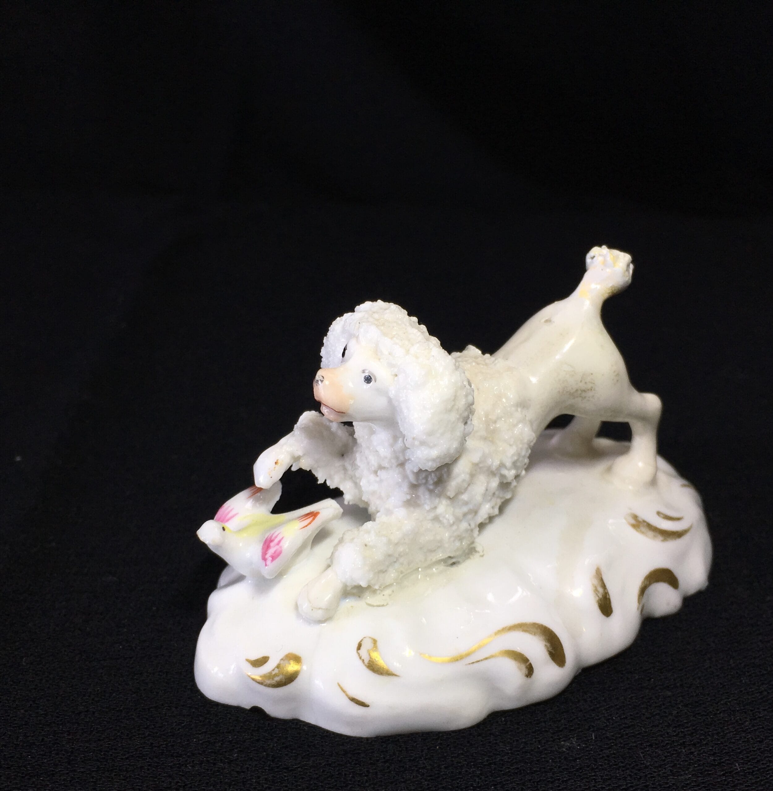 Staffordshire porcelain poodle & bird, c.1835. -0