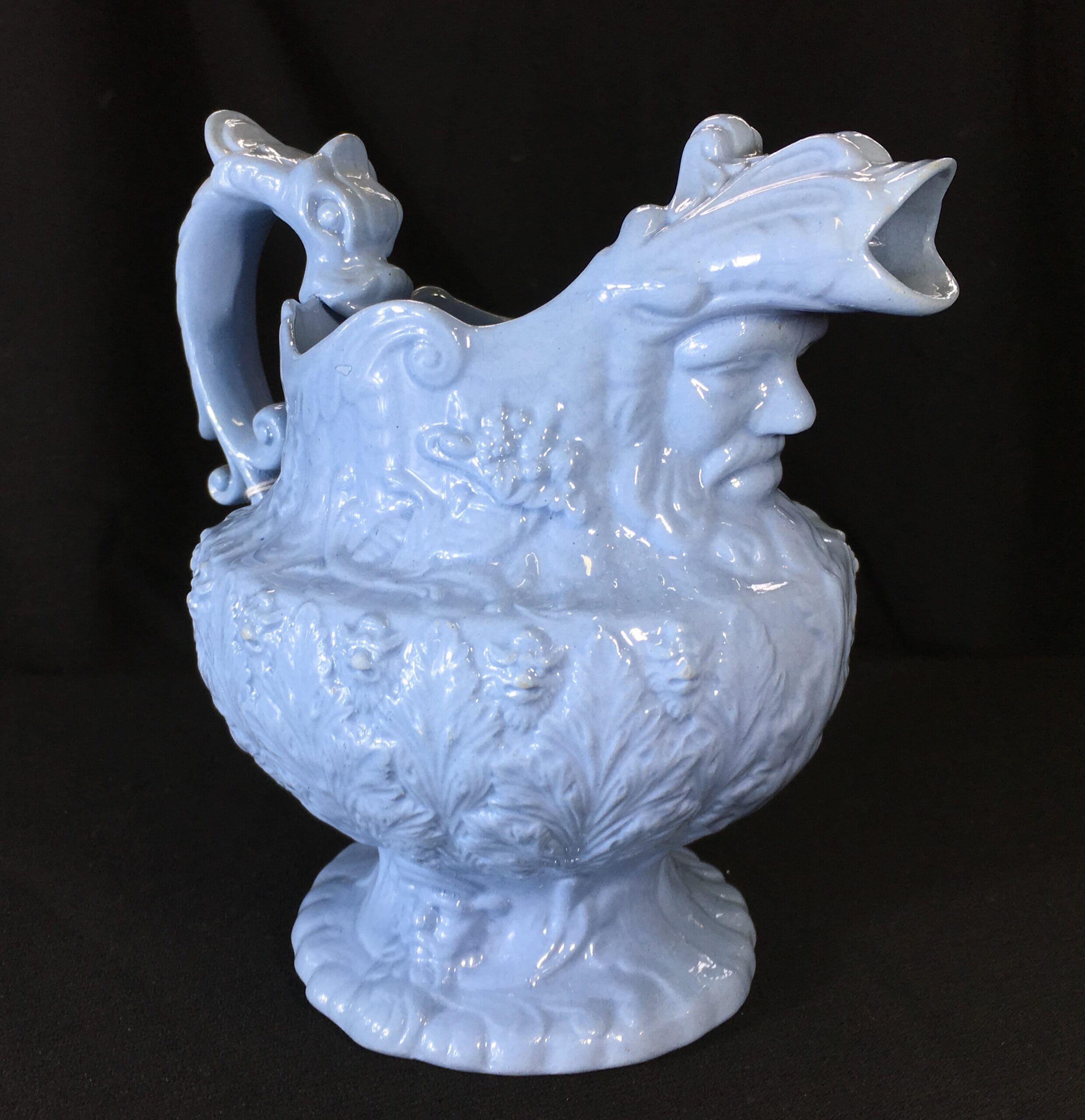 Blue pottery jug, neptune head spout, C. 1830 -0