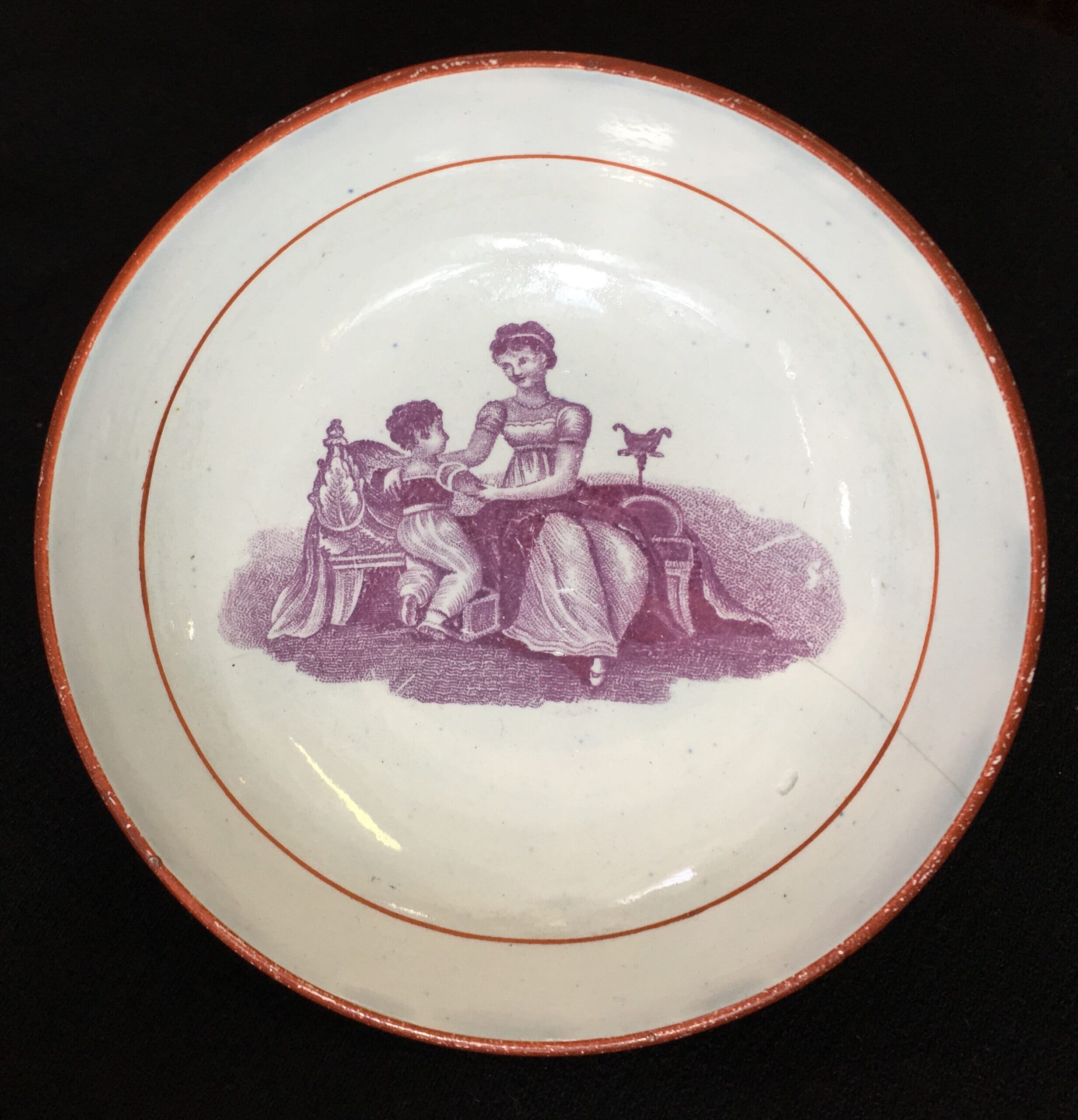 Small creamware saucer, purple bat print of mother & child, c.1810-0