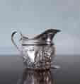 Sterling Silver milk jug, flower embossed, Glasgow 1893-0