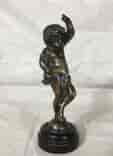 Bronze figure of a child on low plinth, 19th century-0
