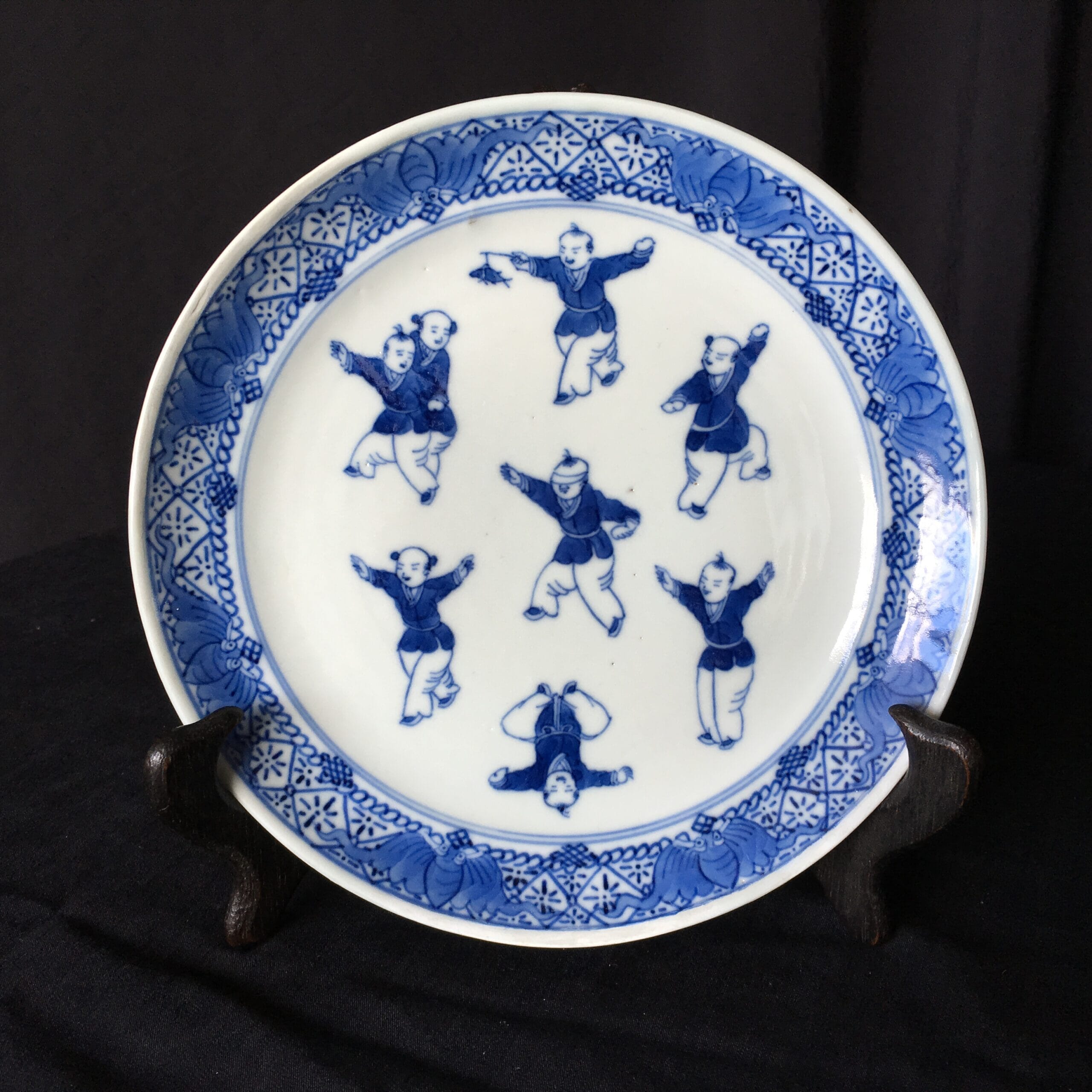 Chinese Export blue & white plate, 'Blind Man's Bluff', c.1780-0