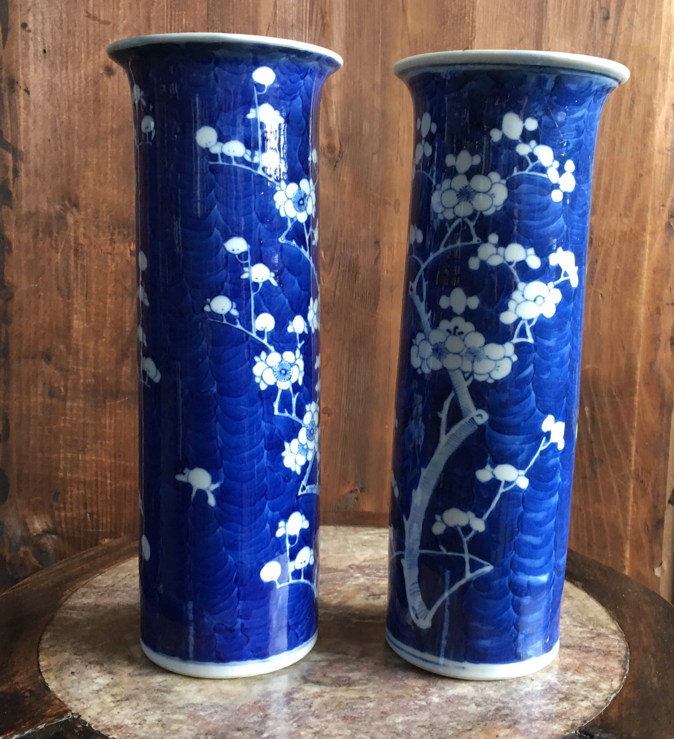 Pair of Chinese cylinder vases, flowering prunus, circa 1900-0